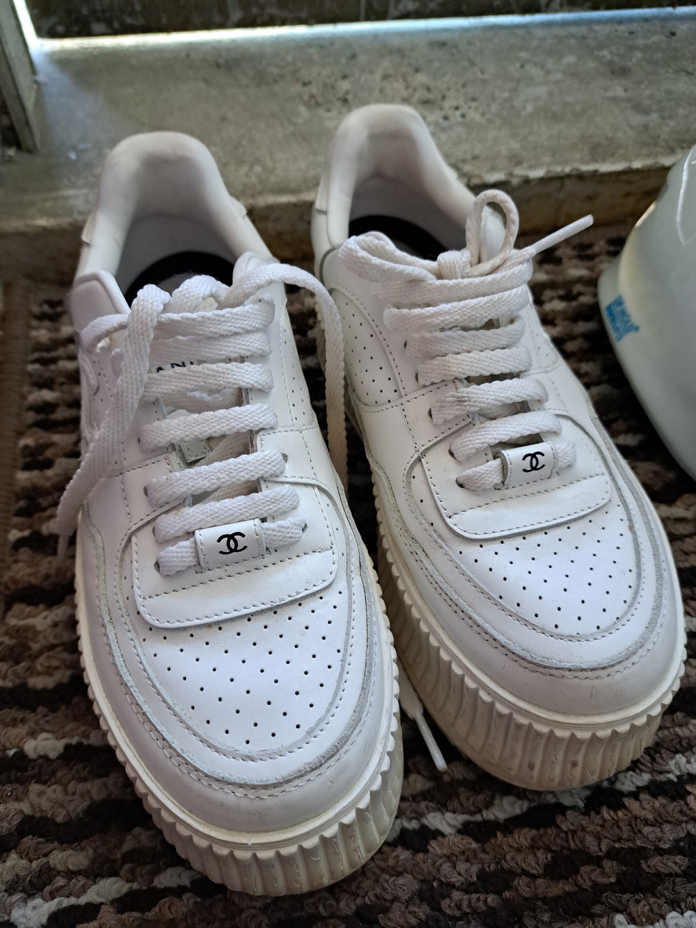 CHANEL White Leather Perforated Lace-Up Sneakers with Logo Charm